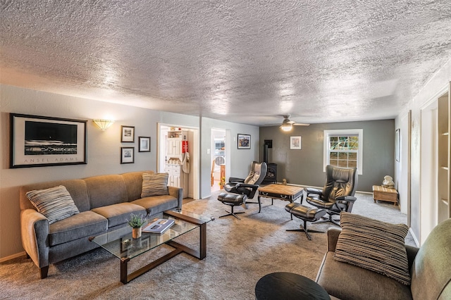 133 County Rd 135, Hernandez, NM 87537 - carpeted living area featuring ceiling fan and a textured ceiling