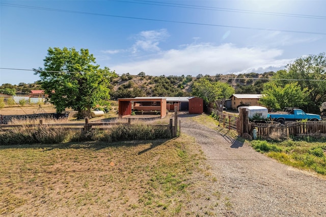 133 County Rd 135, Hernandez, NM 87537 - view of front of house featuring driveway
