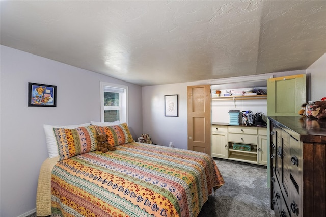 133 County Rd 135, Hernandez, NM 87537 - bedroom featuring dark carpet