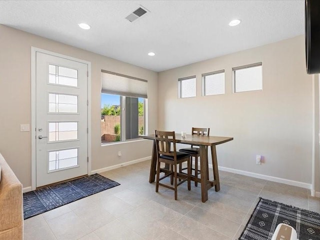 5220 Gold Hill Ln, Santa Fe, NM 87507 - dining area with baseboards and recessed lighting