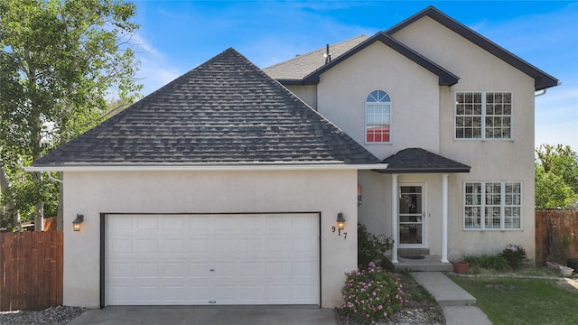 917 Estates Dr, Los Alamos, NM 87544 - traditional-style home with roof with shingles, stucco siding, and a garage