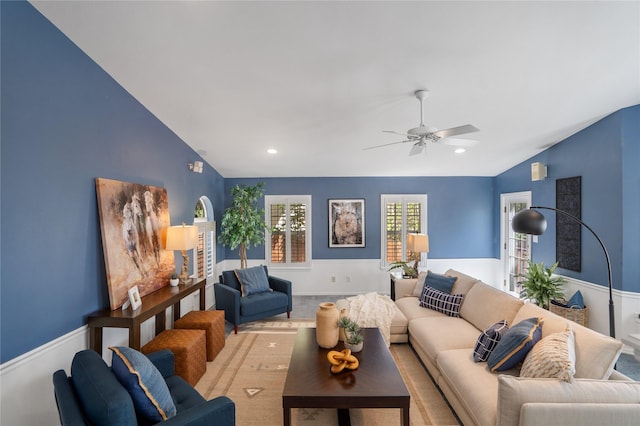 917 Estates Dr, Los Alamos, NM 87544 - living area with lofted ceiling, ceiling fan, and a wainscoted wall