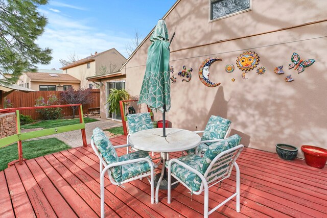 1086 Village Way, Santa Fe, NM 87507 - wooden deck featuring outdoor dining area