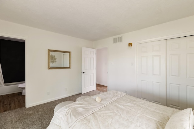 1180 Sioux, Los Alamos, NM 87544 - bedroom with baseboards, a closet, connected bathroom, and carpet flooring