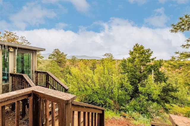 1180 Sioux, Los Alamos, NM 87544 - wooden deck featuring a forest view