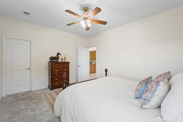 1810 Eucalyptus Rd NE, Rio Rancho, NM 87144 - bedroom featuring light colored carpet and a ceiling fan
