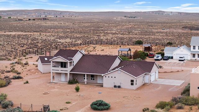 1810 Eucalyptus Rd NE, Rio Rancho, NM 87144 - aerial view of property and surrounding area featuring a desert landscape and a mountain backdrop