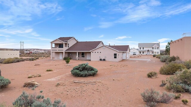 1810 Eucalyptus Rd NE, Rio Rancho, NM 87144 - view of front of house featuring stucco siding and a garage