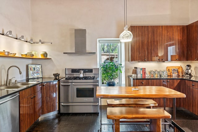 519 E Palace Ave, Santa Fe, NM 87501 - kitchen featuring appliances with stainless steel finishes, wall chimney range hood, a sink, brown cabinetry, and modern cabinets