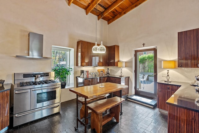 519 E Palace Ave, Santa Fe, NM 87501 - kitchen with double oven range, range hood, wood ceiling with exposed beams, dark countertops, and modern cabinets