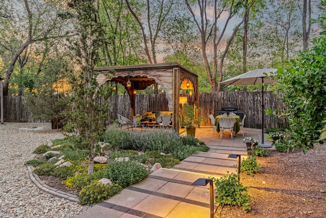 519 E Palace Ave, Santa Fe, NM 87501 - fenced backyard with a patio and a gazebo