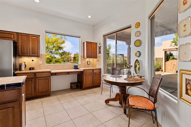 1 Pajarito Peak, Santa Fe, NM 87508 - dining area featuring light tile patterned floors and recessed lighting