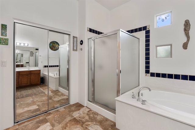 1 Pajarito Peak, Santa Fe, NM 87508 - bathroom with vanity, a garden tub, and a stall shower