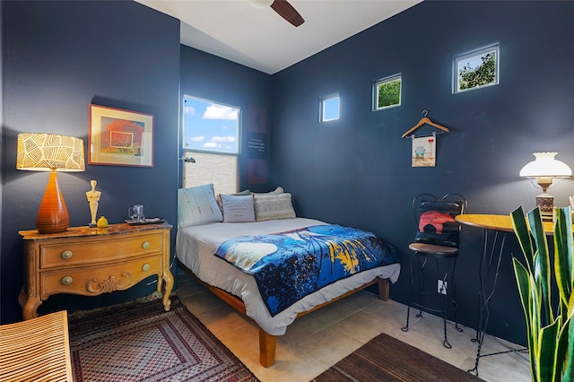 1 Pajarito Peak, Santa Fe, NM 87508 - bedroom with ceiling fan and tile patterned flooring