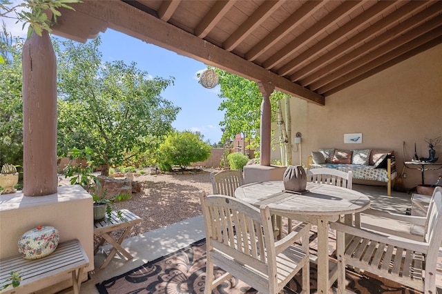 1 Pajarito Peak, Santa Fe, NM 87508 - fenced backyard featuring a patio and outdoor dining space