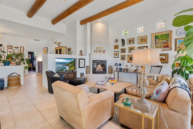 1 Pajarito Peak, Santa Fe, NM 87508 - living room featuring light tile patterned flooring, beamed ceiling, a fireplace, a towering ceiling, and recessed lighting