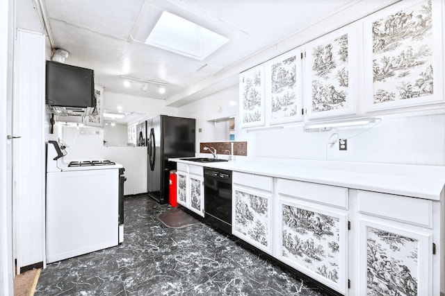108 Phoenix Ave NE, Albuquerque, NM 87107 - kitchen featuring black appliances, a sink, white cabinets, light countertops, and rail lighting