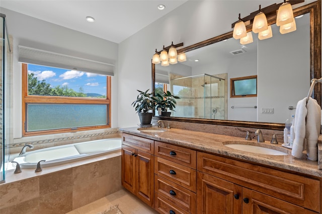 557 Valle Chamiso Ln, Santa Fe, NM 87505 - full bathroom featuring a stall shower, double vanity, and a garden tub