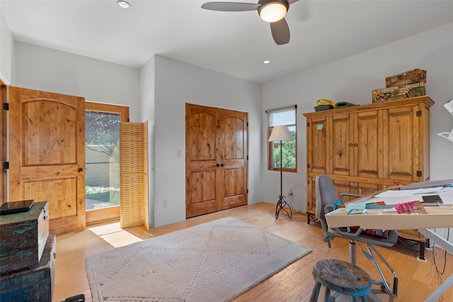 557 Valle Chamiso Ln, Santa Fe, NM 87505 - bedroom featuring access to exterior, light wood-style flooring, ceiling fan, and recessed lighting