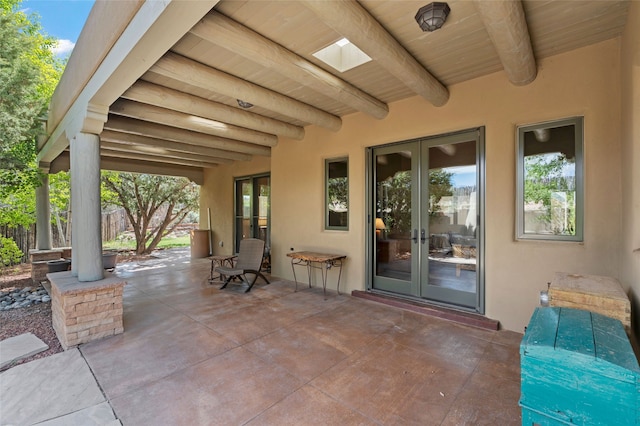 557 Valle Chamiso Ln, Santa Fe, NM 87505 - view of patio with french doors