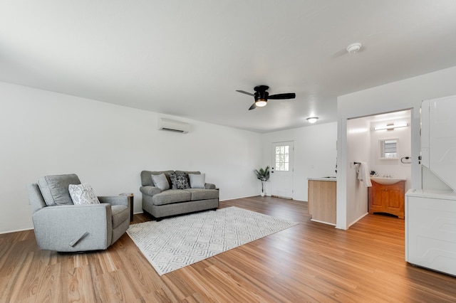 202 Alamo Dr, Santa Fe, NM 87501 - living area with a wall mounted air conditioner, wood finished floors, and ceiling fan