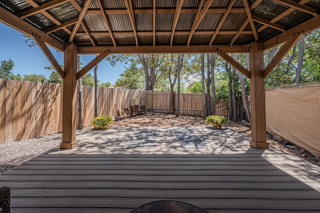 202 Alamo Dr, Santa Fe, NM 87501 - wooden deck featuring a gazebo and a fenced backyard