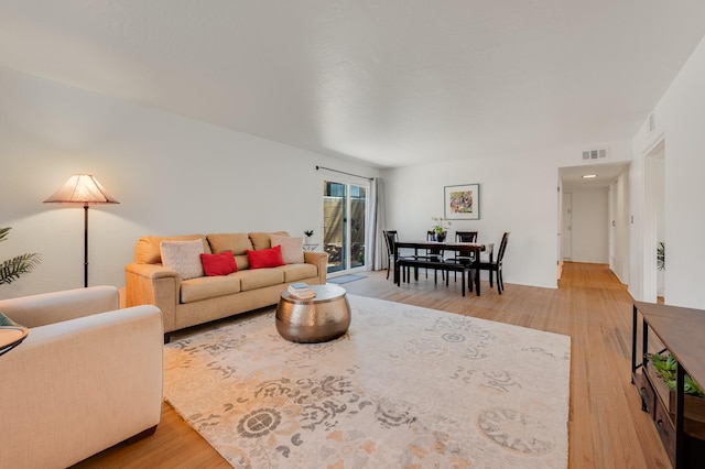 202 Alamo Dr, Santa Fe, NM 87501 - living room featuring light wood-style flooring