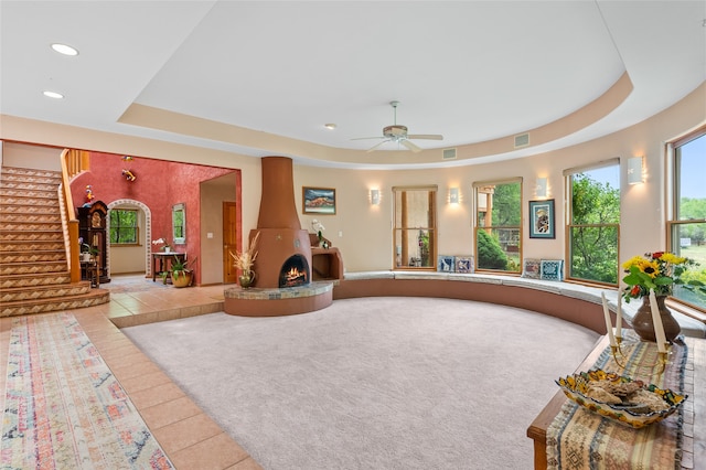 65 E Sombrillo Rd, Nm, NM 87532 - tiled living room with a tray ceiling, recessed lighting, stairway, and a ceiling fan