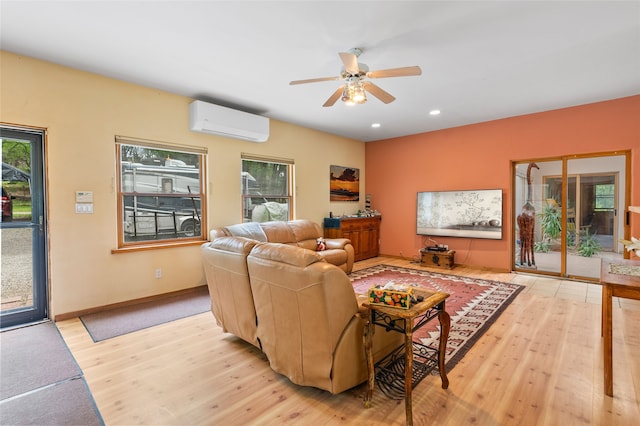 65 E Sombrillo Rd, Nm, NM 87532 - living room with a wall unit AC, light wood-style flooring, ceiling fan, recessed lighting, and baseboards