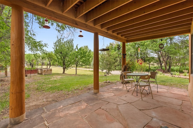 65 E Sombrillo Rd, Nm, NM 87532 - view of patio / terrace featuring outdoor dining area