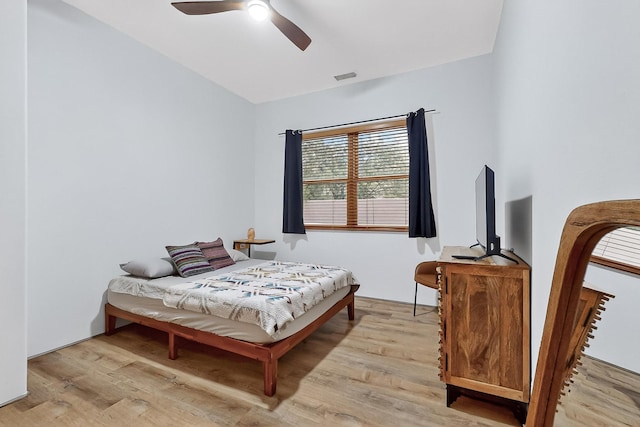 138 E Chili Line, Santa Fe, NM 87508 - bedroom featuring light wood-style flooring and ceiling fan