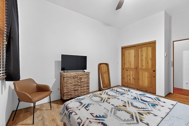 138 E Chili Line, Santa Fe, NM 87508 - bedroom with wood finished floors and ceiling fan