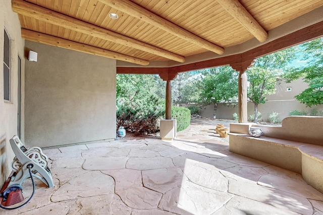 138 E Chili Line, Santa Fe, NM 87508 - fenced backyard with a patio area