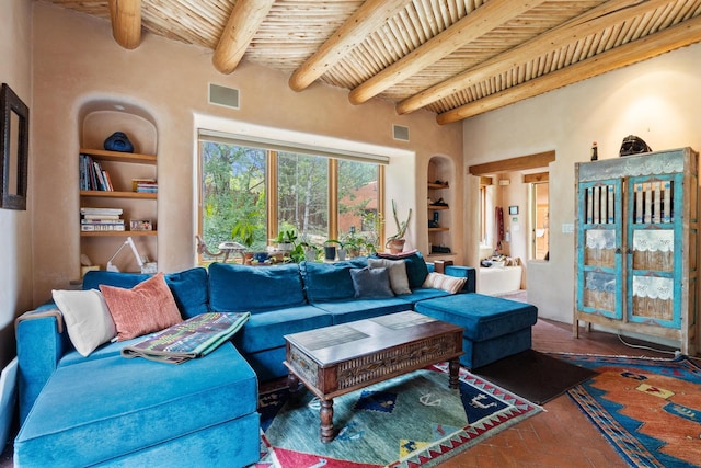 525 Camino Militar, Santa Fe, NM 87501 - living room featuring a wood ceiling with exposed beams and built in shelves