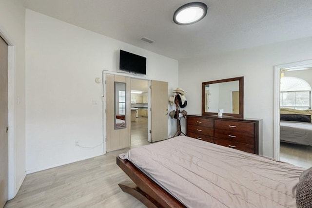 1128 Pandora Dr SW, Los Lunas, NM 87031 - bedroom with light wood-type flooring