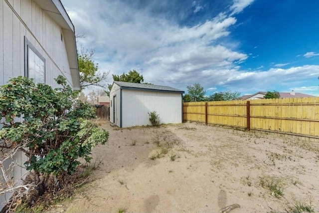1128 Pandora Dr SW, Los Lunas, NM 87031 - fenced backyard with a shed