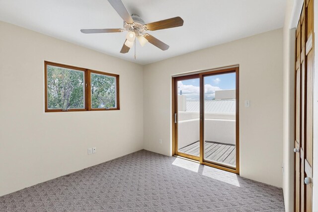 3260 La Paz, Santa Fe, NM 87507 - spare room with carpet flooring and ceiling fan