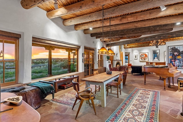 26 Camino Los Angelitos, Santa Fe, NM 87540 - dining area with wooden ceiling with exposed beams