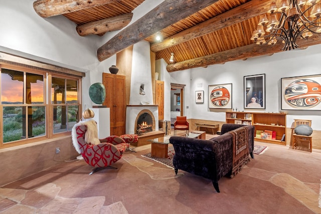 26 Camino Los Angelitos, Santa Fe, NM 87540 - living room with wood ceiling with exposed beams, a towering ceiling, a fireplace, and a chandelier