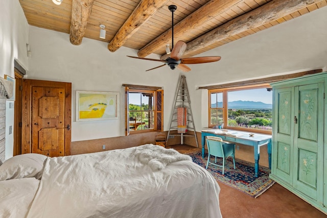 26 Camino Los Angelitos, Santa Fe, NM 87540 - bedroom with wood ceiling with exposed beams and ceiling fan