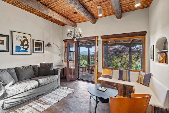 26 Camino Los Angelitos, Santa Fe, NM 87540 - living room featuring wooden ceiling with exposed beams and a chandelier