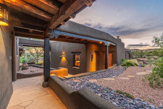 26 Camino Los Angelitos, Santa Fe, NM 87540 - view of property exterior at dusk