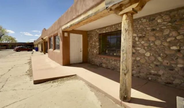 1151 Grand Unit 12, Las Vegas, NM 87701 - view of side of home