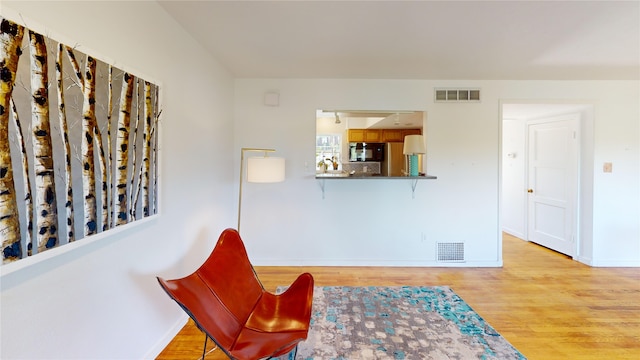 4030 Urban Unit C, Los Alamos, NM 87544 - sitting room with light wood-style flooring and baseboards