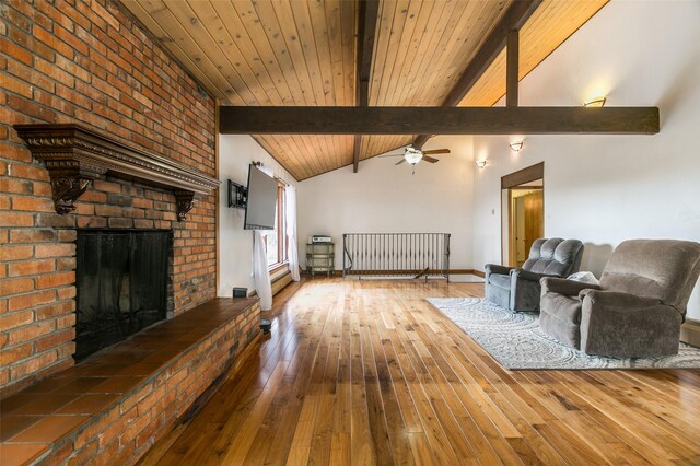 215 San Juan St, Los Alamos, NM 87544 - living area with wood-type flooring, a brick fireplace, ceiling fan, and wood ceiling