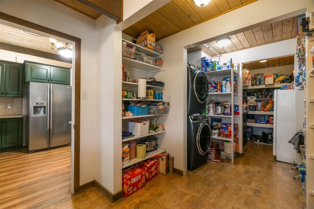 215 San Juan St, Los Alamos, NM 87544 - storage area featuring stacked washing machine and dryer