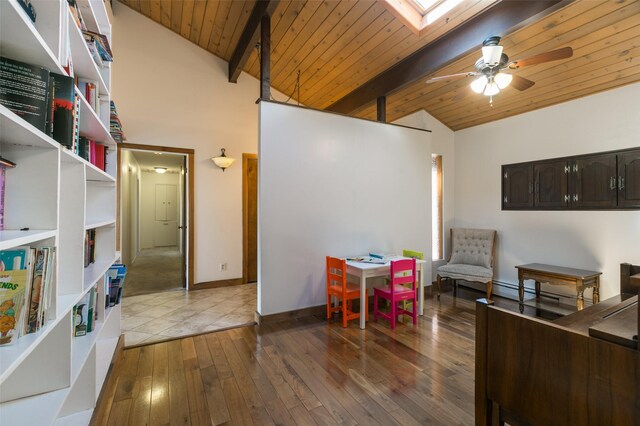 215 San Juan St, Los Alamos, NM 87544 - interior space featuring wooden ceiling with exposed beams, a ceiling fan, wood-type flooring, baseboard heating, and baseboards