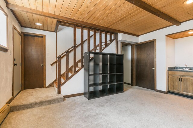 215 San Juan St, Los Alamos, NM 87544 - entrance foyer featuring carpet floors, wooden ceiling with exposed beams, baseboard heating, stairs, and wet bar