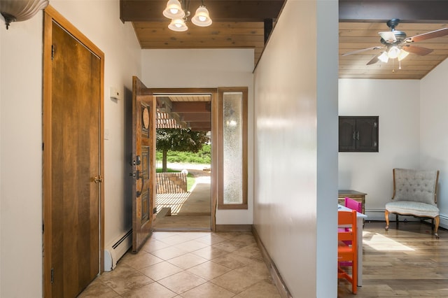 215 San Juan St, Los Alamos, NM 87544 - entrance foyer featuring wood ceiling, a baseboard heating unit, a ceiling fan, baseboards, and light tile patterned floors