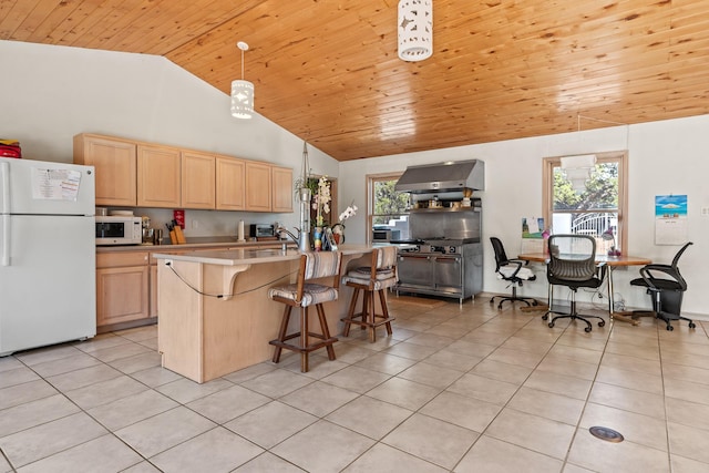 71 Apache Plume Dr, Santa Fe, NM 87508 - kitchen featuring white appliances, light brown cabinets, wall chimney exhaust hood, light tile patterned floors, and wood ceiling